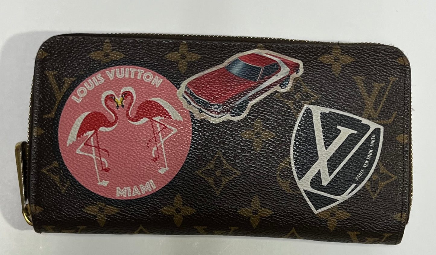 LOUIS VUITTON World Tour Zippy Wallets