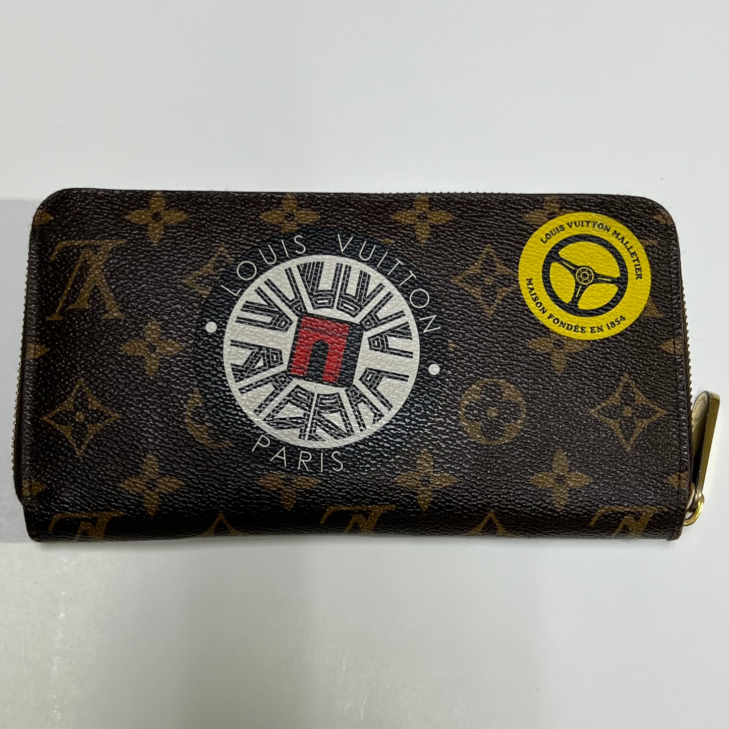 LOUIS VUITTON World Tour Zippy Wallets